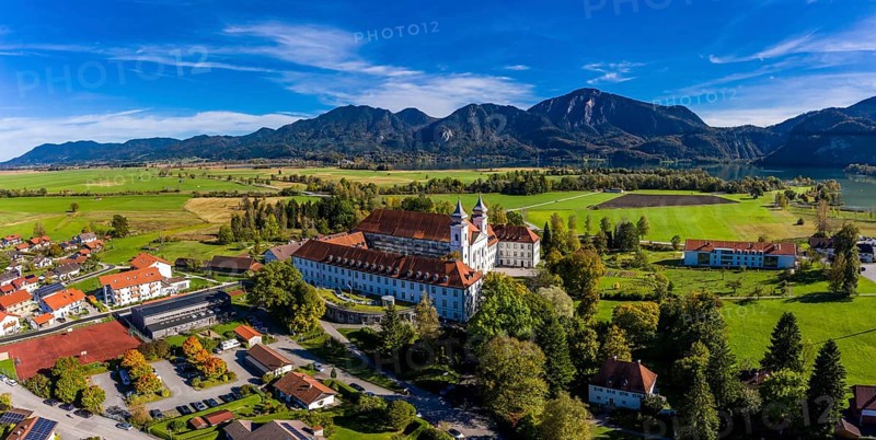 Aerial view of Schlehdorf Monastery with St. Tertulin Parish Church at Lake Lake Kochel