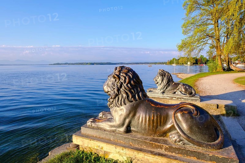 Cast-iron lion figures in front of Midgardhaus at Starnberger See