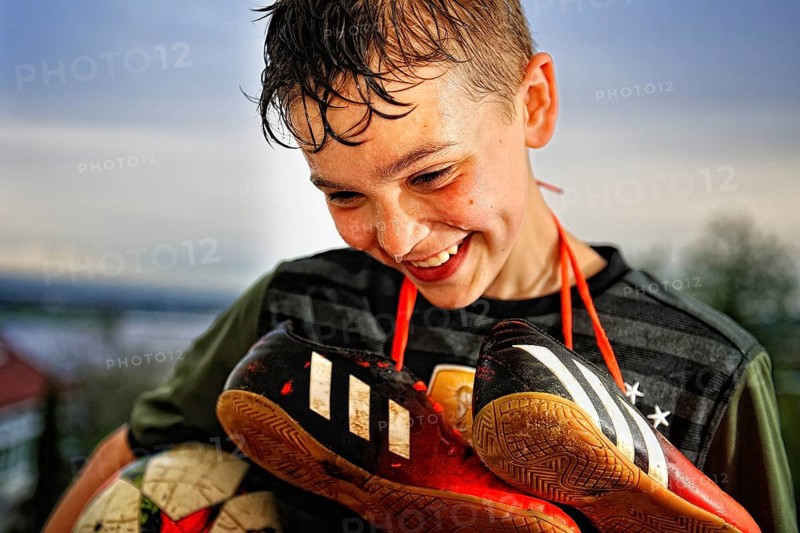 Boy with soccer shoes