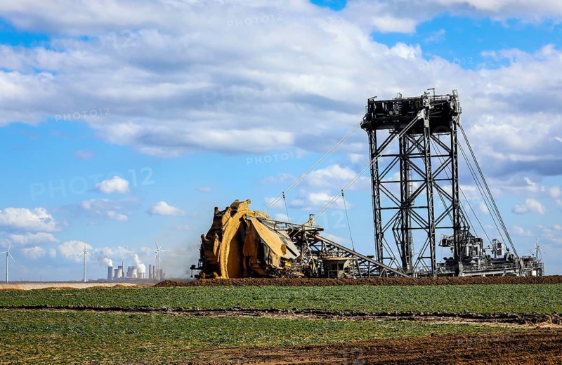 Bucket-wheel excavator wheel excavator in the RWE opencast lignite mine Garzweiler excavates at the demolition edge near Keyenberg