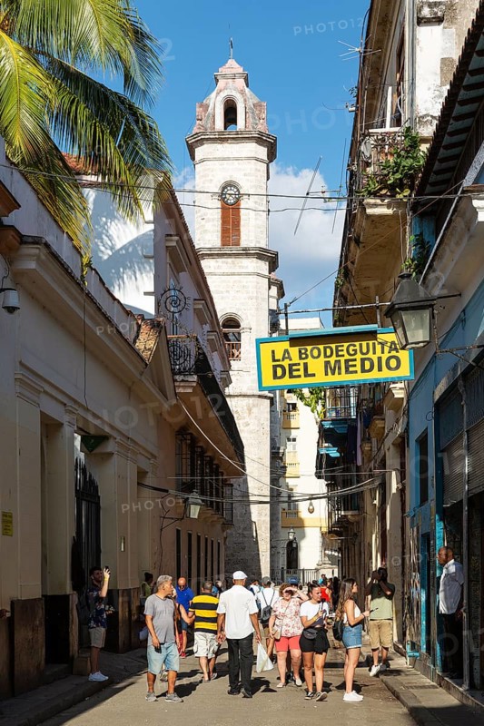 The Bodeguita del Medio and the bell tower of the cathedral behind