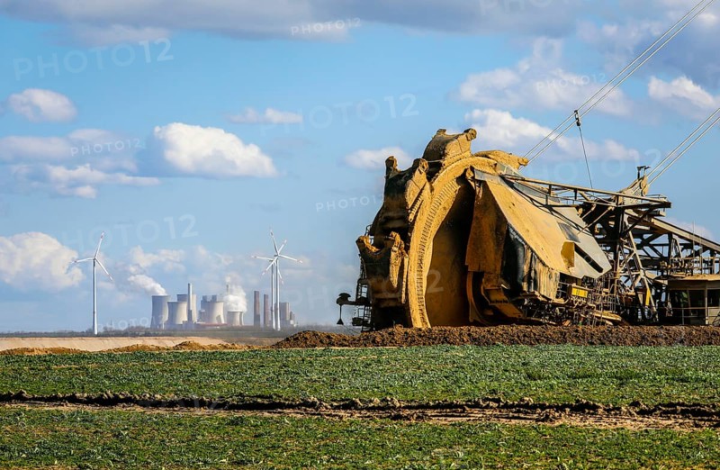 Bucket-wheel excavator wheel excavator in the RWE opencast lignite mine Garzweiler excavates at the demolition edge near Keyenberg