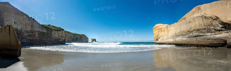 Sand beach with sandstone cliffs