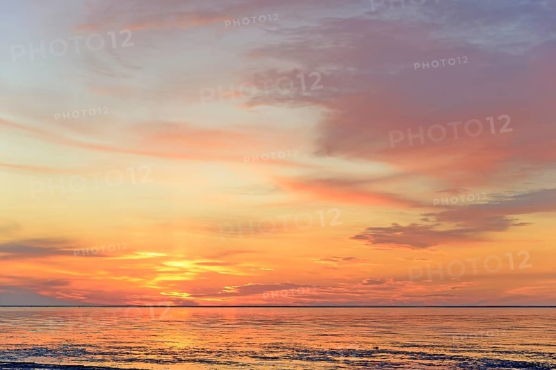 Sunset at the Wadden Sea at low tide