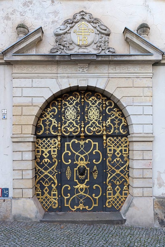 Old decorated wrought-iron gate at the meat market