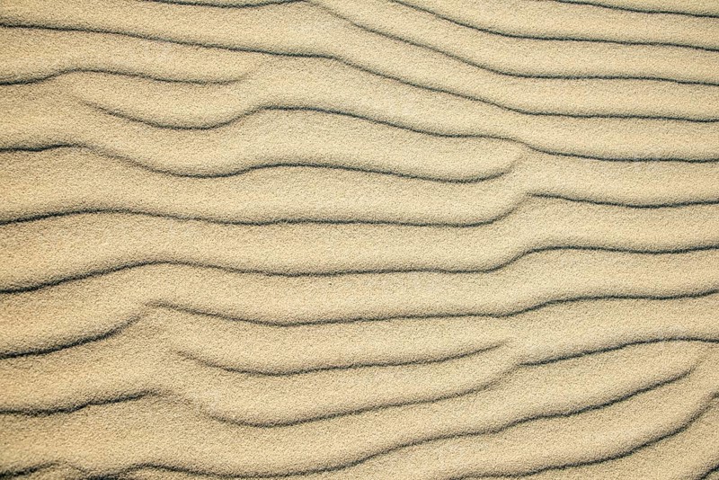 Wave patterns in light sand