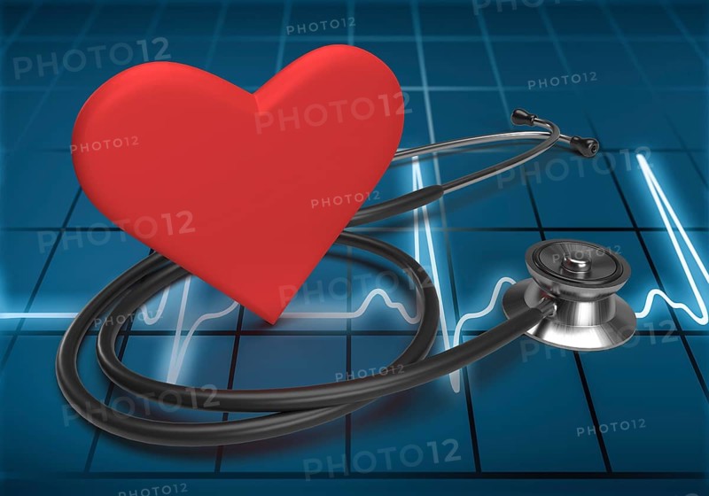 Heart and stethoscope on ECG