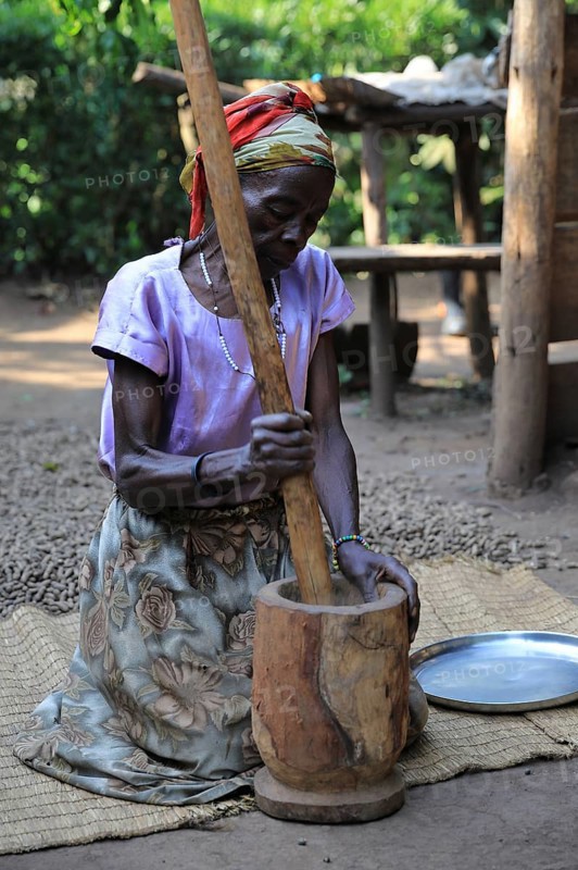 Woman prepares coffee