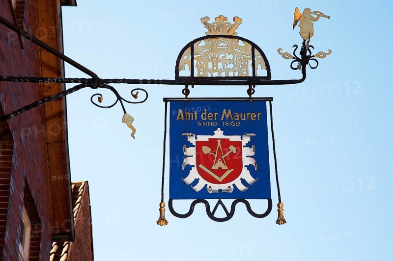 Craftsman's sign Amt der Maurer Anno 1862 on a building in the old town