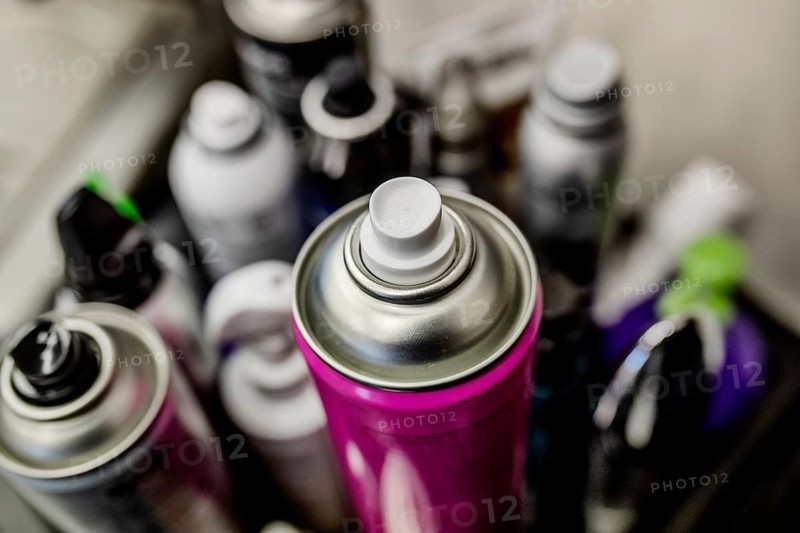 Cans with hairspray in hairdressing salon
