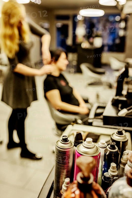 Cans of hairspray in a hairdressing salon