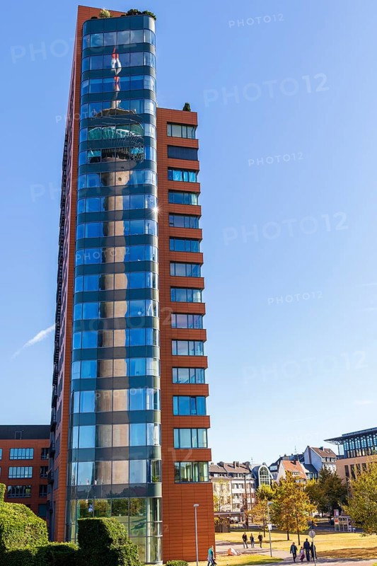 Portobello with reflection of the Rhine Tower in the glass facade