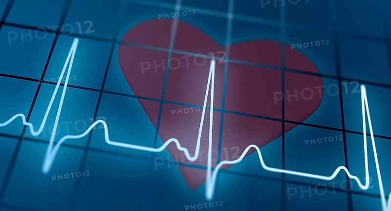 ECG in front of heart symbol