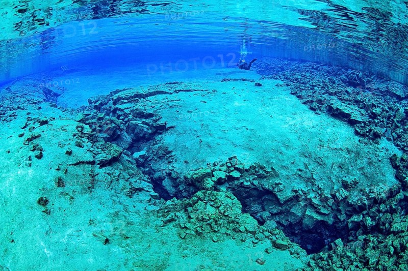 Divers in the Silfra Lagoon