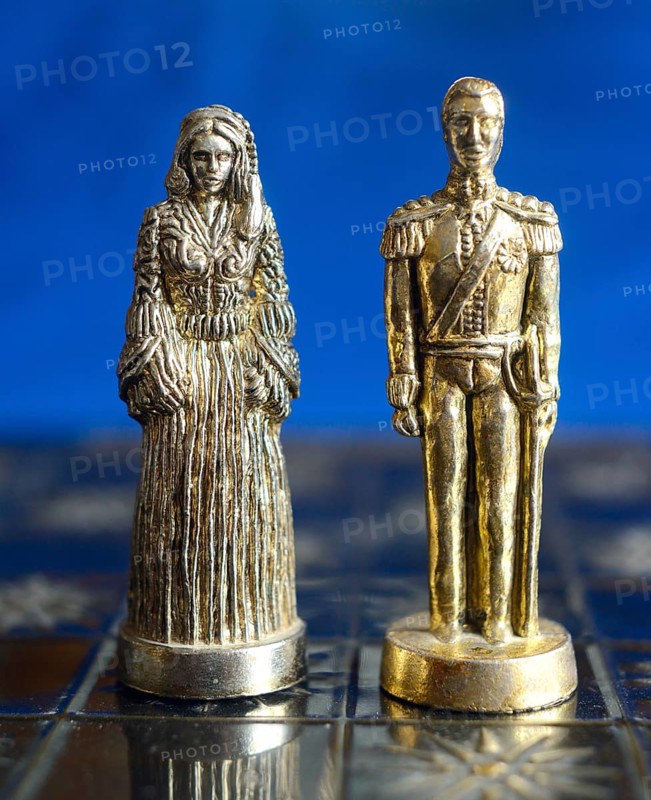 Chess pieces on a play board