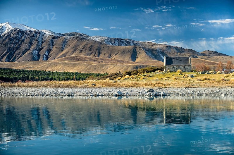 Church of the good Shepard reflected in Lake Tekapo