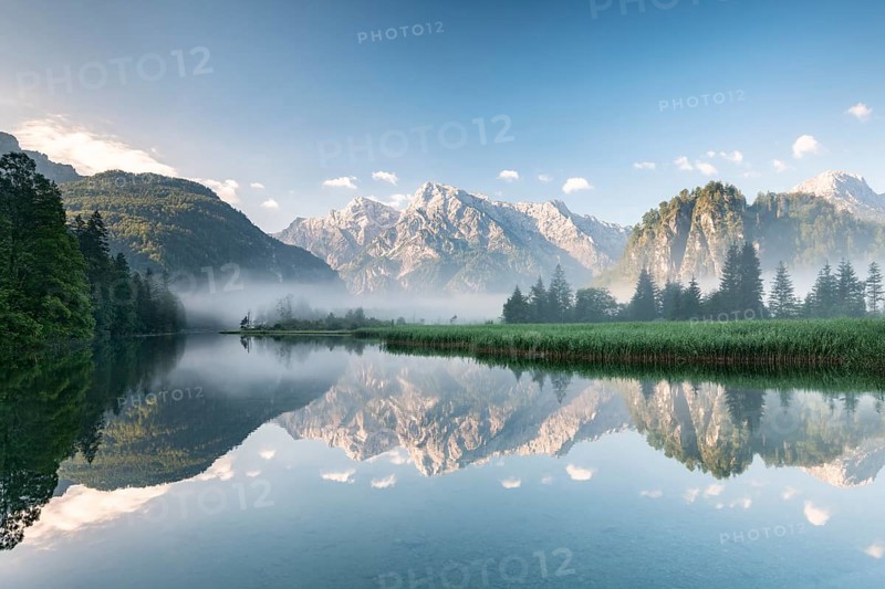Alpine lake with reflection