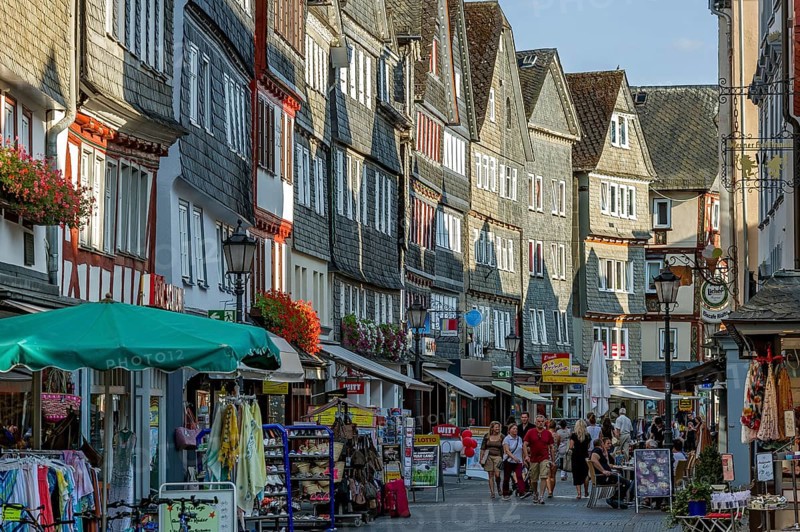 Shopping street with historic half-timbered houses