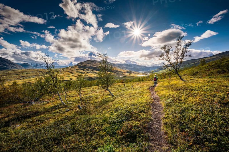 Female hiker in wide landscape