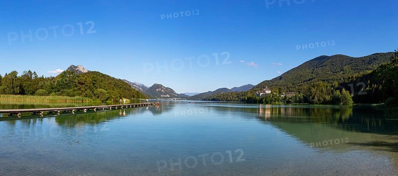 Bathing beach at the Fuschlsee with Fuschl Castle