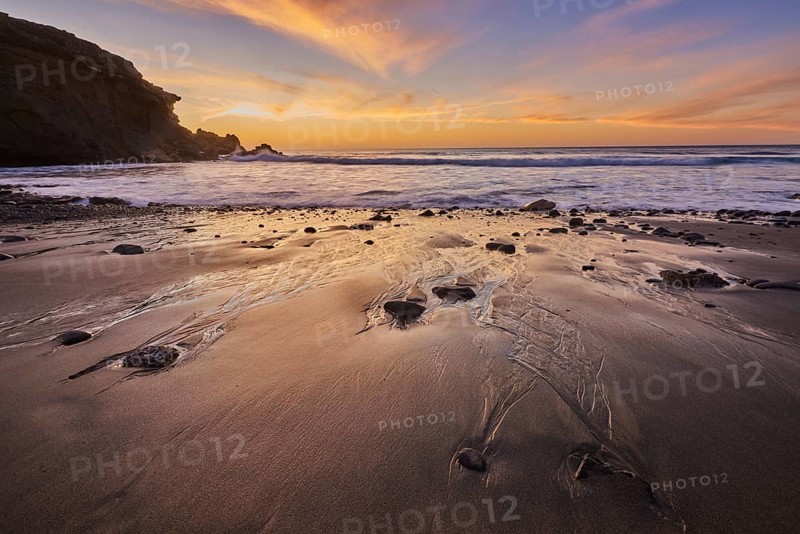 Beach Playa de la Pared at sunset