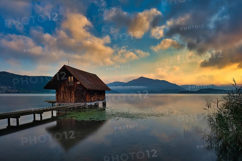 Boathouse on Lake Zug at sunset