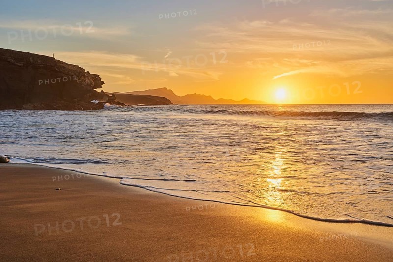 Beach Playa de la Pared at sunset