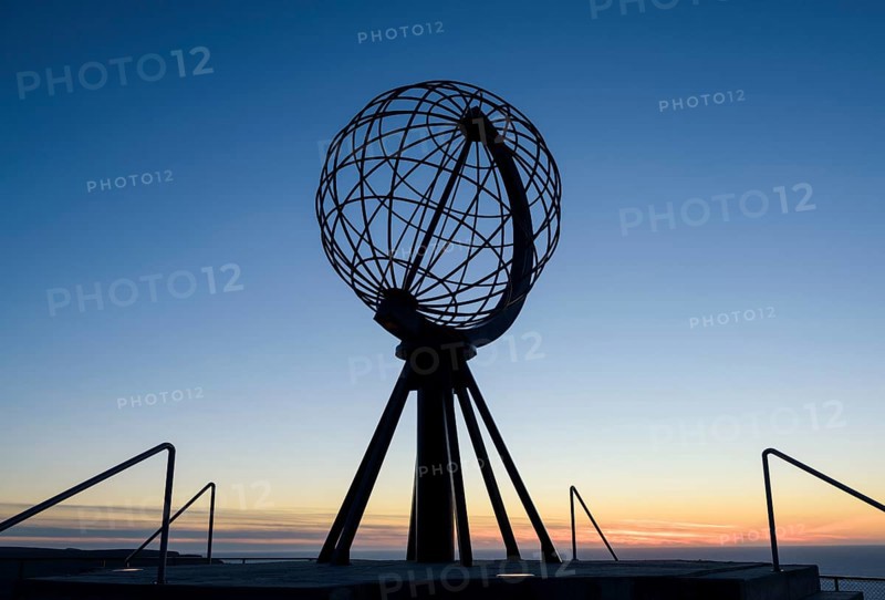 Steel globe on the North Cape after sunset
