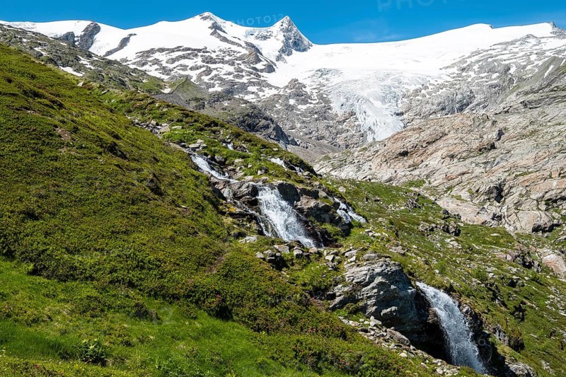 Mountain landscape with glacier Schlatenkees and waterfall