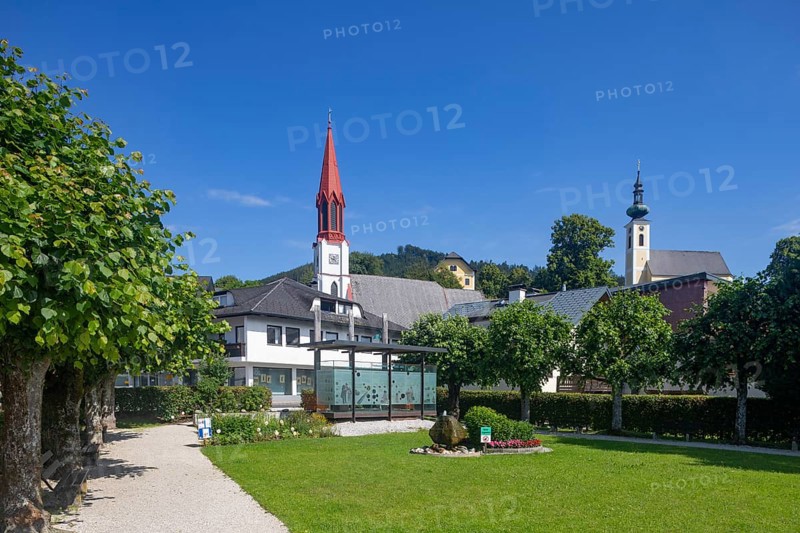 Lake promenade with pile-dwelling village pavilion and protestant church