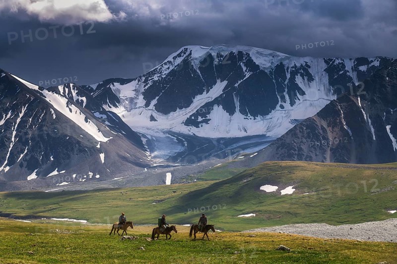 Horse riding tour in Mongolian Altai mountains. Altai 5 bogd mountain