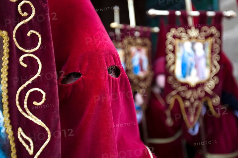 Penitent with traditional headgear