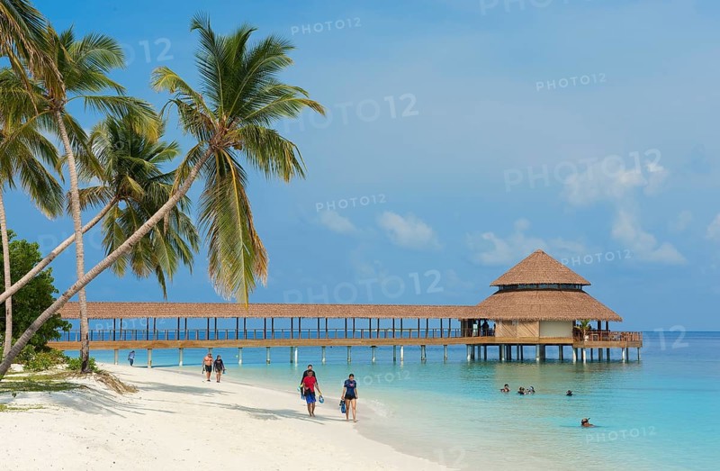 View of beach and jetty from restaurant on stilts in lagoon