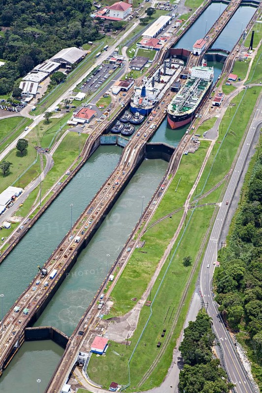 Gas and fuel tanker ships cross Gatun lock from the Pacific side