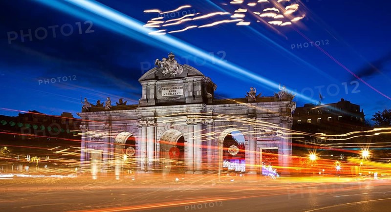 Puerta de Alcala with Christmas lights at dusk