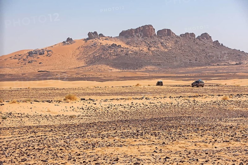 Off-road vehicle on gravel road to the high Atlas Mountains