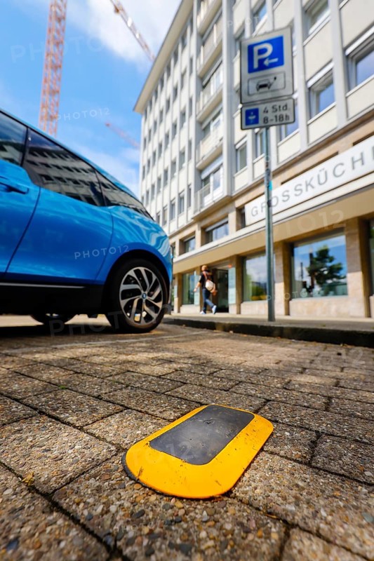 Parking space sensors show car drivers via displays of Smart Poles