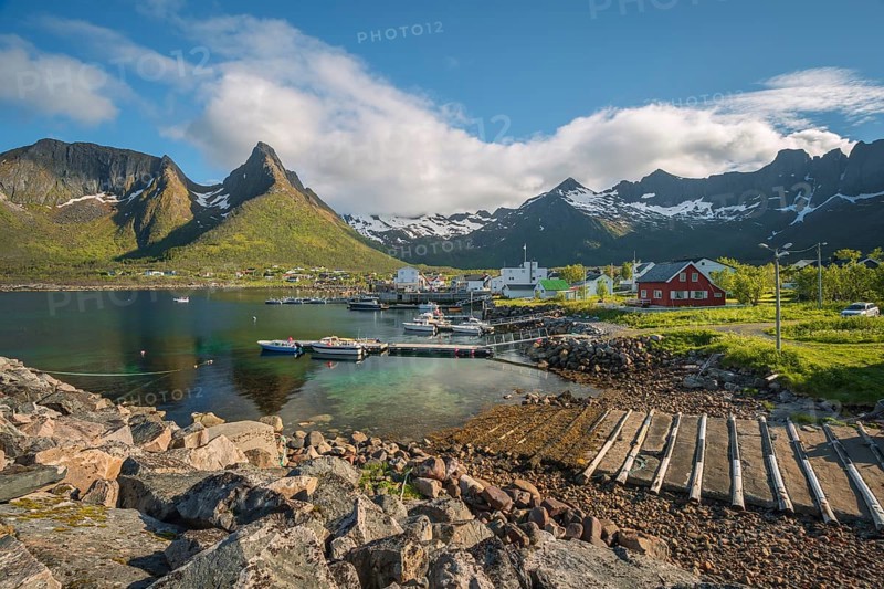 Boat ramp and fishing boats on the fjord in Mefjord