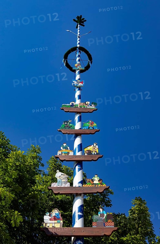 Maypole with woodcarving
