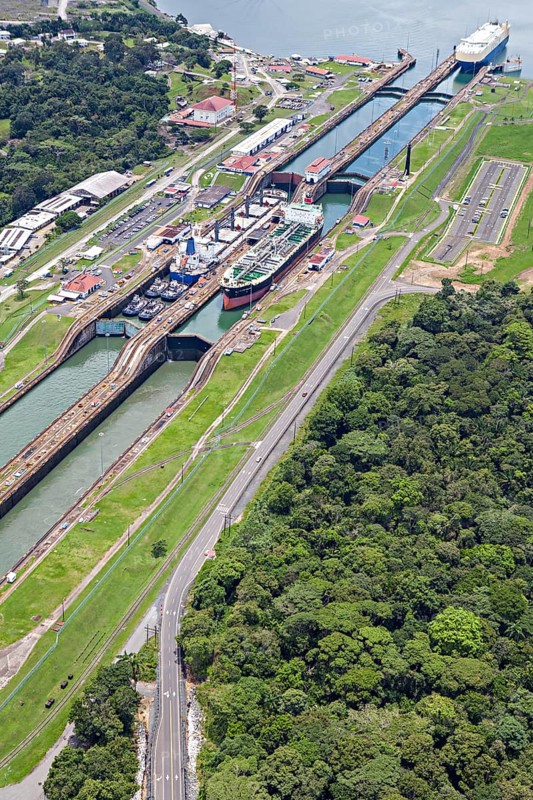 Gas and fuel tanker ships cross Gatun lock from the Pacific side