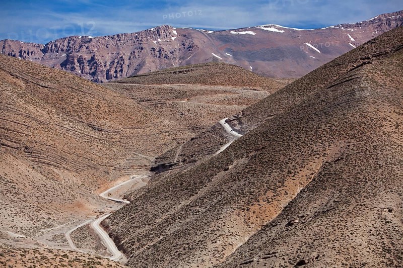 Off-road vehicle on gravel road to Mount Mgoun