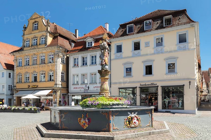 Madonna with a crescent moon on the Marienbrunnen fountain on Marktplatz square