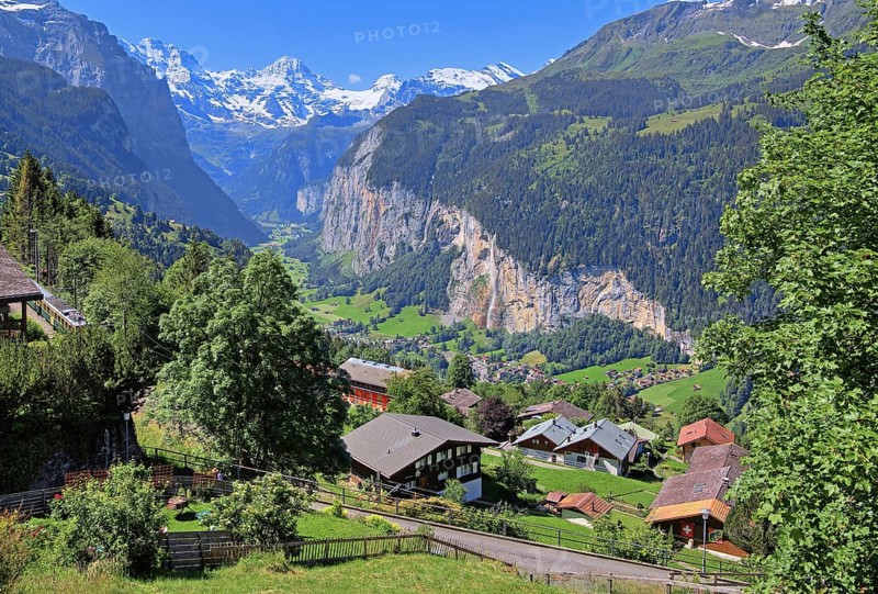 Houses on the edge of the village with Lauterbrunnen Valley and Breithorn