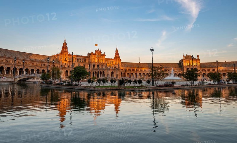 Plaza de Espana in the evening light with reflection in the canal