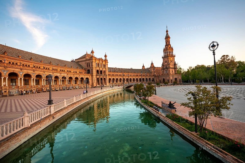 Plaza de Espana in the evening light with reflection in the canal