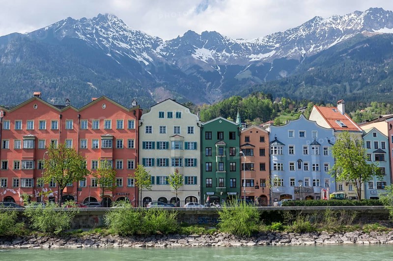 Colourful buildings Mariahilf along the river Inn