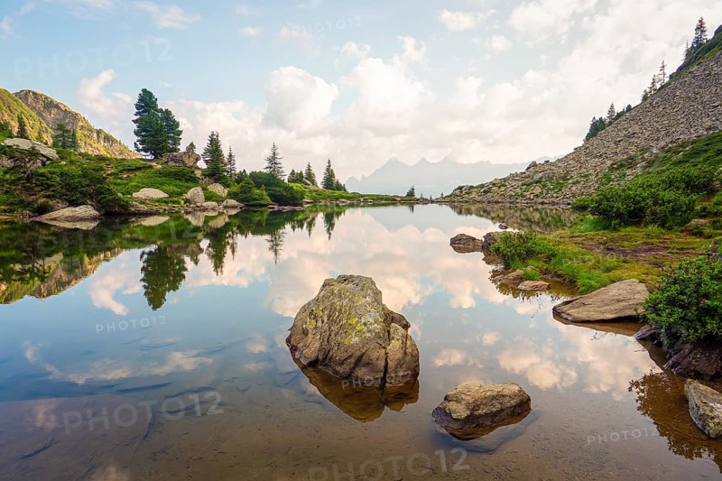 Mirror lake at first light with the Hoher Dachstein in the background