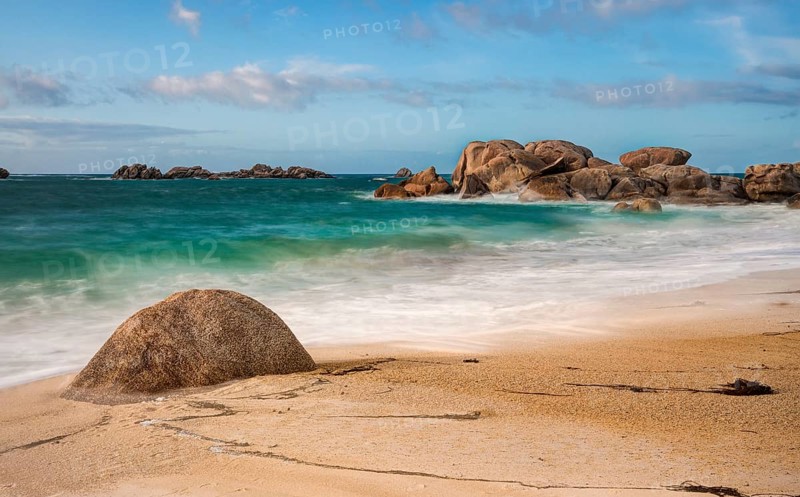Sandy beach and granite rocks in Brittany