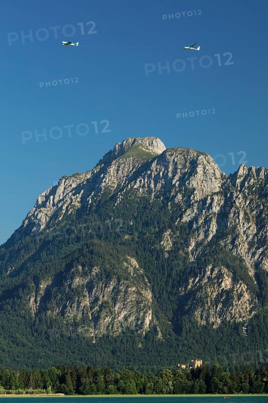 View over the Forgensee to Hohenschwangau Castle and the Tannheim mountains
