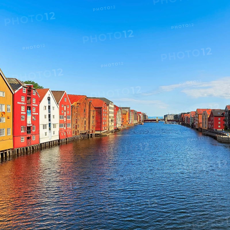 Colourful historic warehouses by the river Nidelva